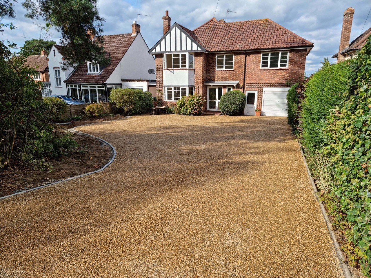 This is a newly installed tar and chip driveway installed by Rushden Driveways